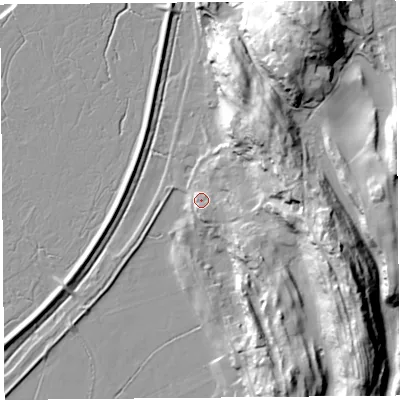 Shaded relief map of the ground around LA77JY, computed from Environment Agency LiDAR. The ground here sits at about 10 m above sea level and falls 47 m across the surrounding 800 m. Surface water reaching this point runs off ground lying to the east, 27.1 m higher.