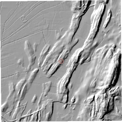Shaded relief map of the ground around LA77LE, computed from Environment Agency LiDAR. The ground here sits at about 9 m above sea level and falls 28 m across the surrounding 800 m. Surface water reaching this point runs off ground lying to the north-north-east, 3.2 m higher.