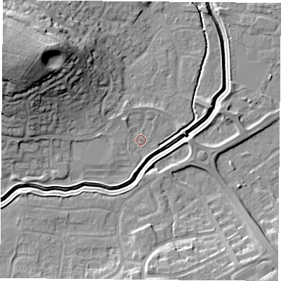 Shaded relief map of the ground around LE114RW, computed from Environment Agency LiDAR. The ground here sits at about 40 m above sea level and falls 23 m across the surrounding 800 m. Surface water reaching this point runs off ground lying to the north-west, 19.5 m higher.