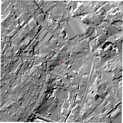 Shaded relief map of the ground around LE115AA, computed from Environment Agency LiDAR. The ground here sits at about 42 m above sea level and falls 10 m across the surrounding 800 m. Surface water reaching this point runs off ground lying to the south-west, 7.6 m higher.