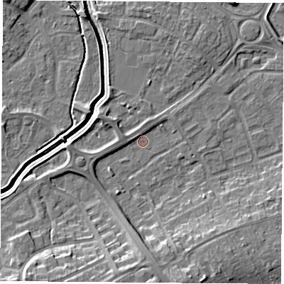 Shaded relief map of the ground around LE115JQ, computed from Environment Agency LiDAR. The ground here sits at about 39 m above sea level and falls 11 m across the surrounding 800 m. Surface water reaching this point runs off ground lying to the south, 9.1 m higher.