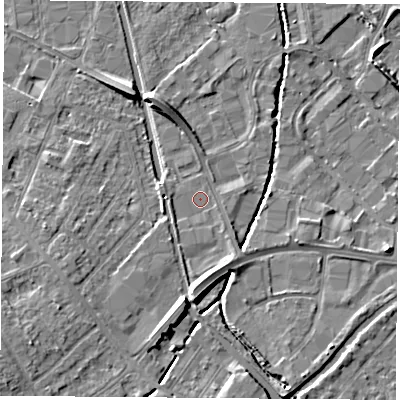 Shaded relief map of the ground around LE115XH, computed from Environment Agency LiDAR. The ground here sits at about 38 m above sea level and falls 7 m across the surrounding 800 m. Surface water reaching this point runs off ground lying to the south, 4.7 m higher.