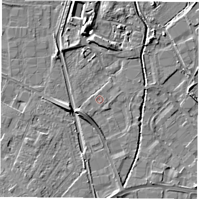 Shaded relief map of the ground around LE115XN, computed from Environment Agency LiDAR. The ground here sits at about 38 m above sea level and falls 10 m across the surrounding 800 m. Surface water reaching this point runs off ground lying to the north, 0.6 m higher.