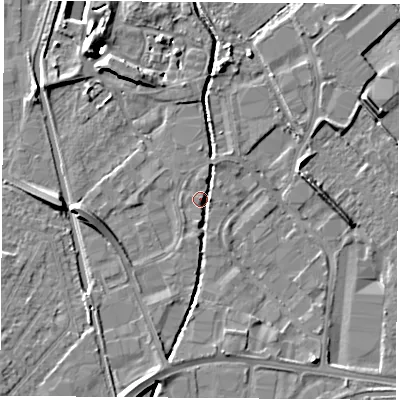 Shaded relief map of the ground around LE115XS, computed from Environment Agency LiDAR. The ground here sits at about 38 m above sea level and falls 11 m across the surrounding 800 m. Surface water reaching this point runs off ground lying to the south, 2.4 m higher.