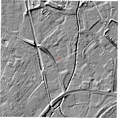 Shaded relief map of the ground around LE115XW, computed from Environment Agency LiDAR. The ground here sits at about 38 m above sea level and falls 7 m across the surrounding 800 m. Surface water reaching this point runs off ground lying to the south, 5.0 m higher.