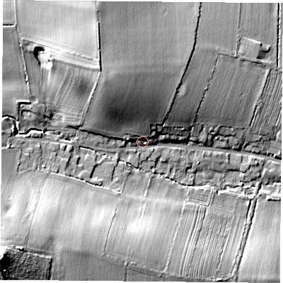 Shaded relief map of the ground around LE128TG, computed from Environment Agency LiDAR. The ground here sits at about 74 m above sea level and falls 29 m across the surrounding 800 m. Surface water reaching this point runs off ground lying to the north-north-west, 14.7 m higher.