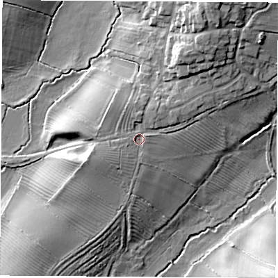 Shaded relief map of the ground around LE129TW, computed from Environment Agency LiDAR. The ground here sits at about 74 m above sea level and falls 16 m across the surrounding 800 m. Surface water reaching this point runs off ground lying to the west-south-west, 3.3 m higher.