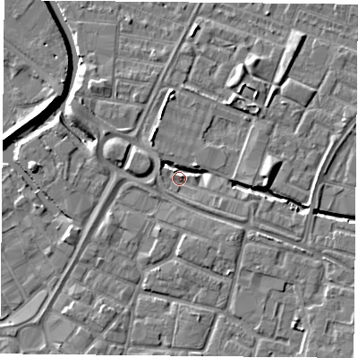 Shaded relief map of the ground around LE12JU, computed from Environment Agency LiDAR. The ground here sits at about 54 m above sea level and falls 7 m across the surrounding 800 m. Surface water reaching this point runs off ground lying to the east, 4.4 m higher.