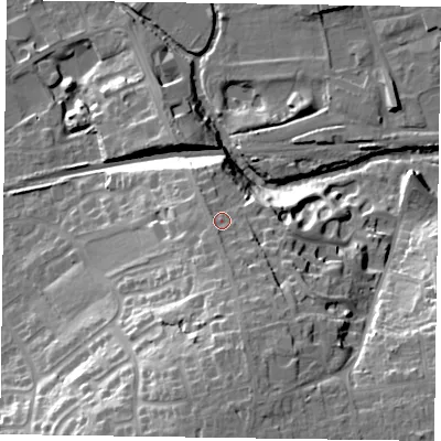 Shaded relief map of the ground around LE130BG, computed from Environment Agency LiDAR. The ground here sits at about 87 m above sea level and falls 27 m across the surrounding 800 m. Surface water reaching this point runs off ground lying to the south, 3.2 m higher.