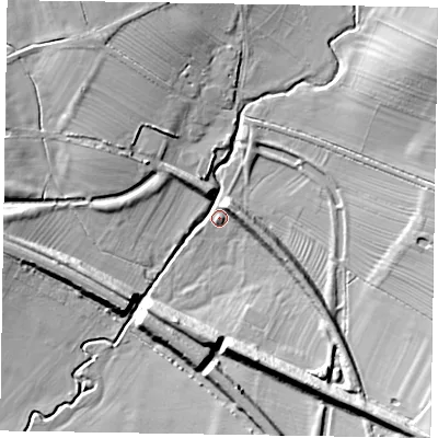 Shaded relief map of the ground around LE142SL, computed from Environment Agency LiDAR. The ground here sits at about 86 m above sea level and falls 17 m across the surrounding 800 m. Surface water reaching this point runs off ground lying to the south-east, 14.5 m higher.