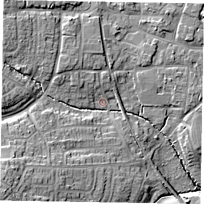 Shaded relief map of the ground around LE156RZ, computed from Environment Agency LiDAR. The ground here sits at about 107 m above sea level and falls 23 m across the surrounding 800 m. Surface water reaching this point runs off ground lying to the south-west, 16.6 m higher.
