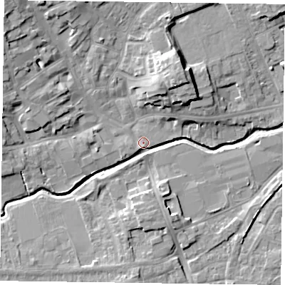 Shaded relief map of the ground around LE169HG, computed from Environment Agency LiDAR. The ground here sits at about 77 m above sea level and falls 13 m across the surrounding 800 m. Surface water reaching this point runs off ground lying to the west, 5.5 m higher.