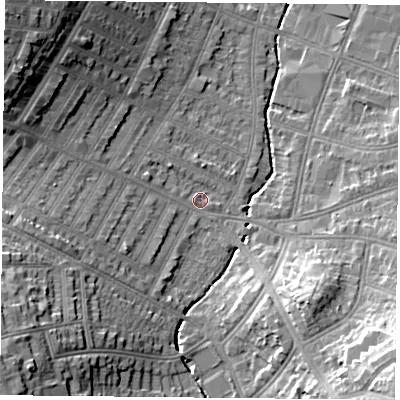 Shaded relief map of the ground around LE21HN, computed from Environment Agency LiDAR. The ground here sits at about 69 m above sea level and falls 23 m across the surrounding 800 m. Surface water reaching this point runs off ground lying to the south-west, 16.3 m higher.