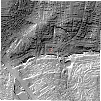 Shaded relief map of the ground around LE24JF, computed from Environment Agency LiDAR. The ground here sits at about 99 m above sea level and falls 28 m across the surrounding 800 m. Surface water reaching this point runs off ground lying to the east-north-east, 3.2 m higher.