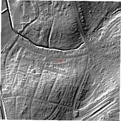 Shaded relief map of the ground around LE26GF, computed from Environment Agency LiDAR. The ground here sits at about 65 m above sea level and falls 18 m across the surrounding 800 m. Surface water reaching this point runs off ground lying to the south-south-west, 11.8 m higher.