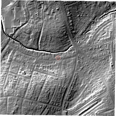 Shaded relief map of the ground around LE26GG, computed from Environment Agency LiDAR. The ground here sits at about 65 m above sea level and falls 18 m across the surrounding 800 m. Surface water reaching this point runs off ground lying to the south-east, 11.3 m higher.