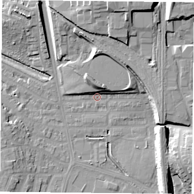 Shaded relief map of the ground around LE27NL, computed from Environment Agency LiDAR. The ground here sits at about 60 m above sea level and falls 21 m across the surrounding 800 m. Surface water reaching this point runs off ground lying to the north, 9.8 m higher.