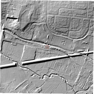 Shaded relief map of the ground around LE29TR, computed from Environment Agency LiDAR. The ground here sits at about 69 m above sea level and falls 23 m across the surrounding 800 m. Surface water reaching this point runs off ground lying to the north, 4.8 m higher.