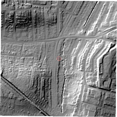 Shaded relief map of the ground around LE30US, computed from Environment Agency LiDAR. The ground here sits at about 60 m above sea level and falls 23 m across the surrounding 800 m. Surface water reaching this point runs off ground lying to the south-west, 16.6 m higher.