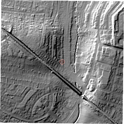 Shaded relief map of the ground around LE30UW, computed from Environment Agency LiDAR. The ground here sits at about 63 m above sea level and falls 22 m across the surrounding 800 m. Surface water reaching this point runs off ground lying to the west-north-west, 12.1 m higher.