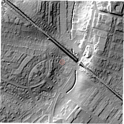 Shaded relief map of the ground around LE31AS, computed from Environment Agency LiDAR. The ground here sits at about 63 m above sea level and falls 21 m across the surrounding 800 m. Surface water reaching this point runs off ground lying to the west, 15.0 m higher.