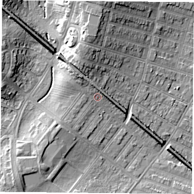 Shaded relief map of the ground around LE31AY, computed from Environment Agency LiDAR. The ground here sits at about 65 m above sea level and falls 14 m across the surrounding 800 m. Surface water reaching this point runs off ground lying to the north-north-west, 6.6 m higher.