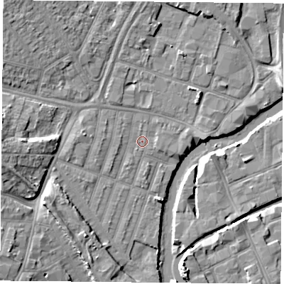 Shaded relief map of the ground around LE35EL, computed from Environment Agency LiDAR. The ground here sits at about 54 m above sea level and falls 9 m across the surrounding 800 m. Surface water reaching this point runs off ground lying to the west, 6.7 m higher.
