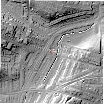 Shaded relief map of the ground around LE36AW, computed from Environment Agency LiDAR. The ground here sits at about 59 m above sea level and falls 22 m across the surrounding 800 m. Surface water reaching this point runs off ground lying to the west-north-west, 2.3 m higher.