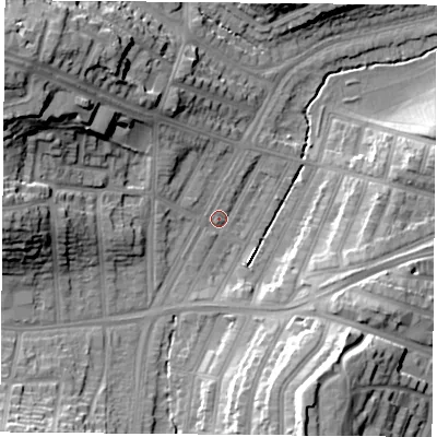 Shaded relief map of the ground around LE36DX, computed from Environment Agency LiDAR. The ground here sits at about 60 m above sea level and falls 26 m across the surrounding 800 m. Surface water reaching this point runs off ground lying to the north-west, 22.0 m higher.