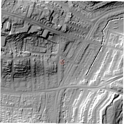 Shaded relief map of the ground around LE36DZ, computed from Environment Agency LiDAR. The ground here sits at about 61 m above sea level and falls 27 m across the surrounding 800 m. Surface water reaching this point runs off ground lying to the north-west, 21.4 m higher.