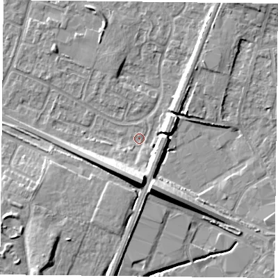 Shaded relief map of the ground around LE47TQ, computed from Environment Agency LiDAR. The ground here sits at about 53 m above sea level and falls 12 m across the surrounding 800 m. Surface water reaching this point runs off ground lying to the south, 11.5 m higher.