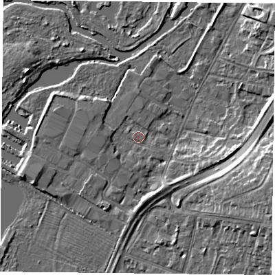 Shaded relief map of the ground around LE48AB, computed from Environment Agency LiDAR. The ground here sits at about 50 m above sea level and falls 11 m across the surrounding 800 m. Surface water reaching this point runs off ground lying to the south, 1.1 m higher.