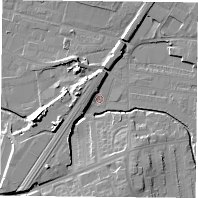 Shaded relief map of the ground around LE50DA, computed from Environment Agency LiDAR. The ground here sits at about 57 m above sea level and falls 17 m across the surrounding 800 m. Surface water reaching this point runs off ground lying to the south-west, 12.4 m higher.