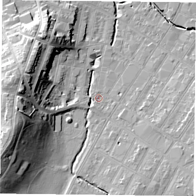 Shaded relief map of the ground around LE53TT, computed from Environment Agency LiDAR. The ground here sits at about 61 m above sea level and falls 28 m across the surrounding 800 m. Surface water reaching this point runs off ground lying to the west, 25.2 m higher.