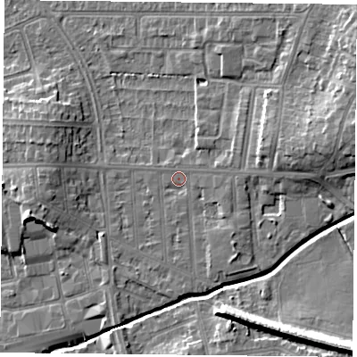 Shaded relief map of the ground around LE54DG, computed from Environment Agency LiDAR. The ground here sits at about 65 m above sea level and falls 13 m across the surrounding 800 m. Surface water reaching this point runs off ground lying to the east-north-east, 4.7 m higher.