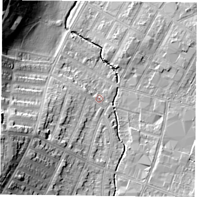 Shaded relief map of the ground around LE55AL, computed from Environment Agency LiDAR. The ground here sits at about 65 m above sea level and falls 23 m across the surrounding 800 m. Surface water reaching this point runs off ground lying to the south-west, 7.0 m higher.