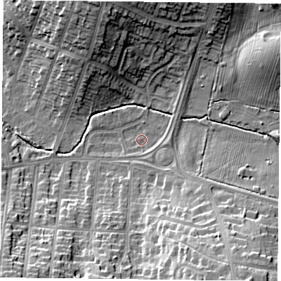 Shaded relief map of the ground around LE55DY, computed from Environment Agency LiDAR. The ground here sits at about 76 m above sea level and falls 20 m across the surrounding 800 m. Surface water reaching this point runs off ground lying to the east, 1.9 m higher.