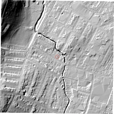 Shaded relief map of the ground around LE55FE, computed from Environment Agency LiDAR. The ground here sits at about 64 m above sea level and falls 25 m across the surrounding 800 m. Surface water reaching this point runs off ground lying to the south-west, 18.8 m higher.