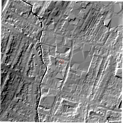 Shaded relief map of the ground around LE55NG, computed from Environment Agency LiDAR. The ground here sits at about 66 m above sea level and falls 11 m across the surrounding 800 m. Surface water reaching this point runs off ground lying to the south, 1.5 m higher.