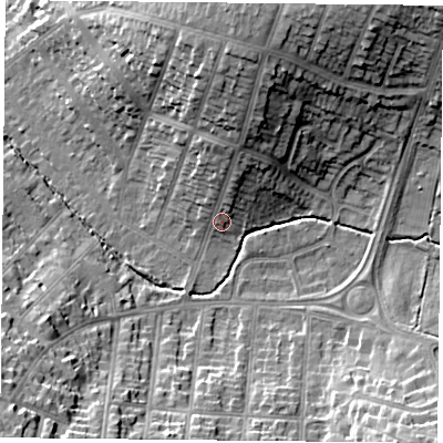 Shaded relief map of the ground around LE55RF, computed from Environment Agency LiDAR. The ground here sits at about 77 m above sea level and falls 23 m across the surrounding 800 m. Surface water reaching this point runs off ground lying to the north, 14.4 m higher.