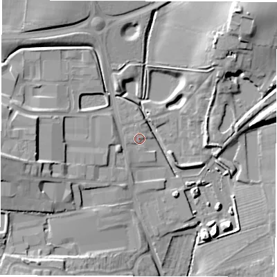 Shaded relief map of the ground around LE652AE, computed from Environment Agency LiDAR. The ground here sits at about 135 m above sea level and falls 23 m across the surrounding 800 m. Surface water reaching this point runs off ground lying to the west-south-west, 2.3 m higher.