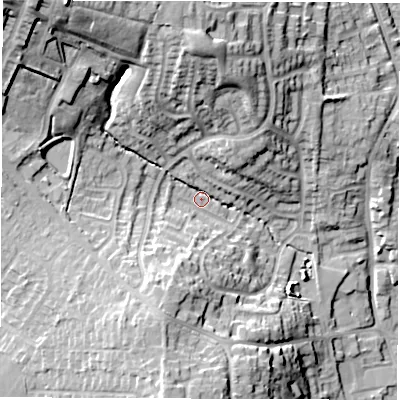 Shaded relief map of the ground around LE652QY, computed from Environment Agency LiDAR. The ground here sits at about 131 m above sea level and falls 33 m across the surrounding 800 m. Surface water reaching this point runs off ground lying to the north-west, 25.7 m higher.