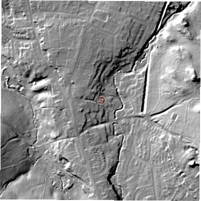 Shaded relief map of the ground around LE678DD, computed from Environment Agency LiDAR. The ground here sits at about 115 m above sea level and falls 41 m across the surrounding 800 m. Surface water reaching this point runs off ground lying to the west-north-west, 5.1 m higher.
