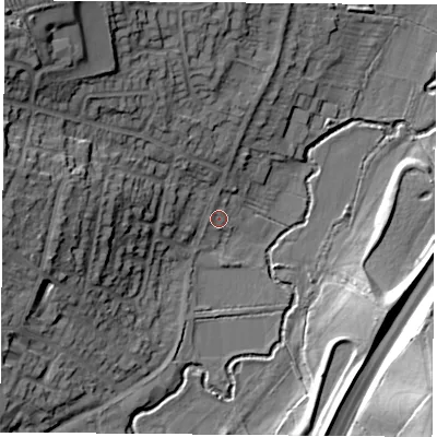 Shaded relief map of the ground around LE77BQ, computed from Environment Agency LiDAR. The ground here sits at about 61 m above sea level and falls 26 m across the surrounding 800 m. Surface water reaching this point runs off ground lying to the north-west, 21.0 m higher.