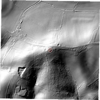 Shaded relief map of the ground around LE79DN, computed from Environment Agency LiDAR. The ground here sits at about 203 m above sea level and falls 40 m across the surrounding 800 m. Surface water reaching this point runs off ground lying to the west-north-west, 1.6 m higher.
