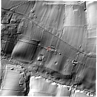 Shaded relief map of the ground around LE79JU, computed from Environment Agency LiDAR. The ground here sits at about 113 m above sea level and falls 29 m across the surrounding 800 m. Surface water reaching this point runs off ground lying to the north, 6.8 m higher.