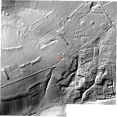 Shaded relief map of the ground around LE85UT, computed from Environment Agency LiDAR. The ground here sits at about 122 m above sea level and falls 23 m across the surrounding 800 m. Surface water reaching this point runs off ground lying to the east-north-east, 1.0 m higher.