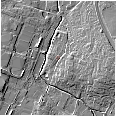 Shaded relief map of the ground around LE86AA, computed from Environment Agency LiDAR. The ground here sits at about 69 m above sea level and falls 12 m across the surrounding 800 m. Surface water reaching this point runs off ground lying to the south-east, 3.9 m higher.