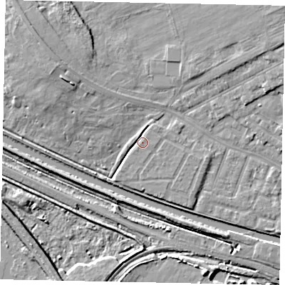 Shaded relief map of the ground around LN11AX, computed from Environment Agency LiDAR. The ground here sits at about 7 m above sea level and falls 11 m across the surrounding 800 m. Surface water reaching this point runs off ground lying to the south-west, 2.2 m higher.