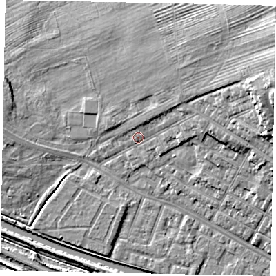 Shaded relief map of the ground around LN11RX, computed from Environment Agency LiDAR. The ground here sits at about 7 m above sea level and falls 22 m across the surrounding 800 m. Surface water reaching this point runs off ground lying to the east-north-east, 16.0 m higher.